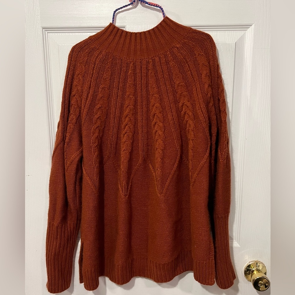 Burnt orange turtleneck sweater with pattern